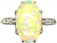 Early 20th Century Platinum, Opal Ring with Diamond Set Shoulders