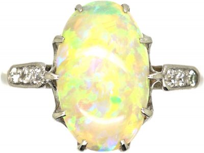 Early 20th Century Platinum, Opal Ring with Diamond Set Shoulders