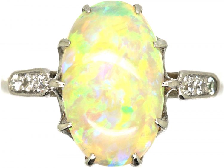 Early 20th Century Platinum, Opal Ring with Diamond Set Shoulders