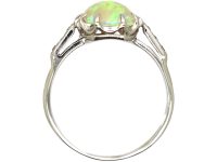 Early 20th Century Platinum, Opal Ring with Diamond Set Shoulders