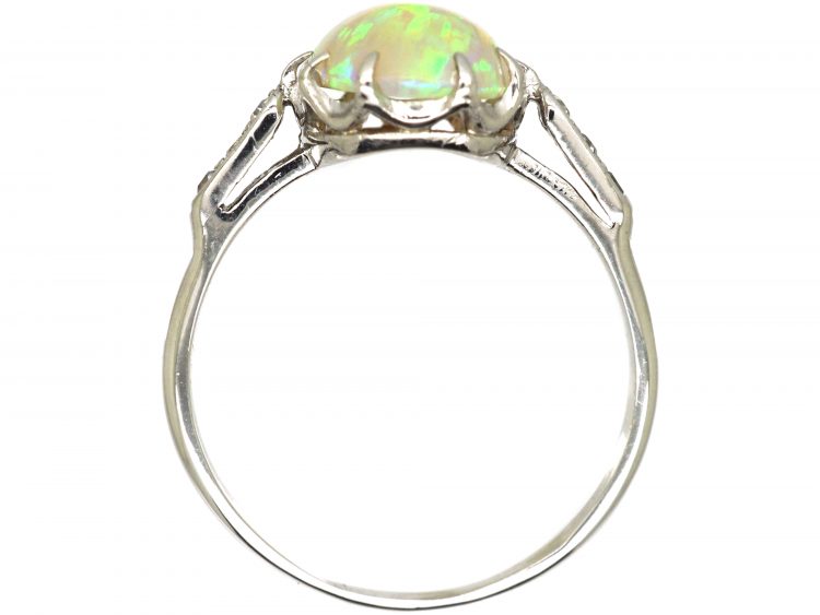 Early 20th Century Platinum, Opal Ring with Diamond Set Shoulders