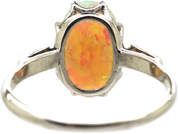 Early 20th Century Platinum, Opal Ring with Diamond Set Shoulders