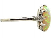 Early 20th Century Platinum, Opal Ring with Diamond Set Shoulders