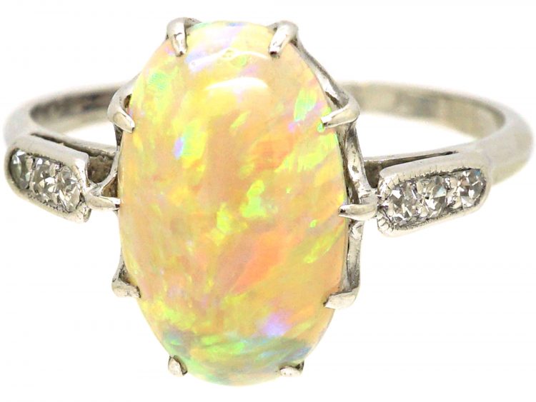 Early 20th Century Platinum, Opal Ring with Diamond Set Shoulders