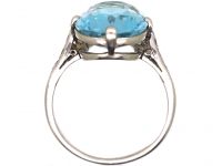 Early 20th Century Platinum Ring set with an Aquamarine with Diamond Set Shoulders