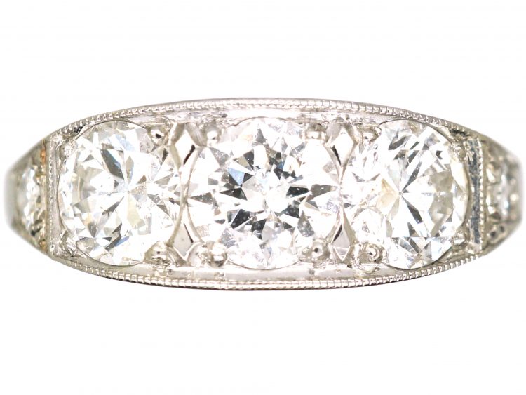 French Art Deco Platinum Three Stone Diamond Ring with Diamond Set Shoulders