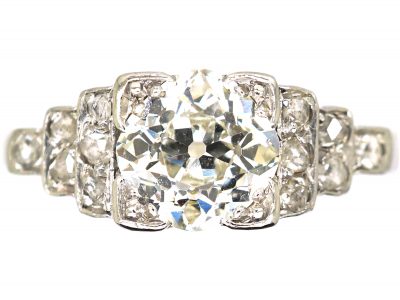Art Deco Platinum, Solitaire Diamond Ring with Step Cut Shoulders set with Rose Diamonds