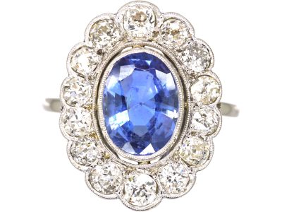 Early 20th Century Platinum, Large Sapphire & Diamond Oval Cluster Ring