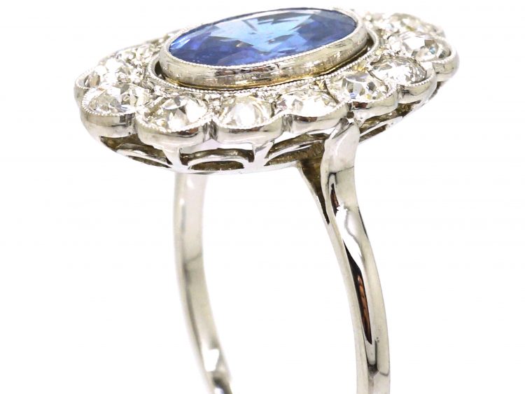 Early 20th Century Platinum, Large Sapphire & Diamond Oval Cluster Ring