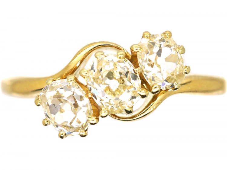 Edwardian 18ct gold, Three Stone Old Mine Cut Diamond Crossover Ring