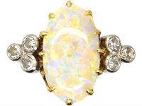 Edwardian 18ct Gold Ring set with a Large Opal with Diamond Shoulders