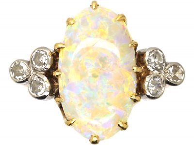 Edwardian 18ct Gold Ring set with a Large Opal with Diamond Shoulders