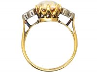 Edwardian 18ct Gold Ring set with a Large Opal with Diamond Shoulders