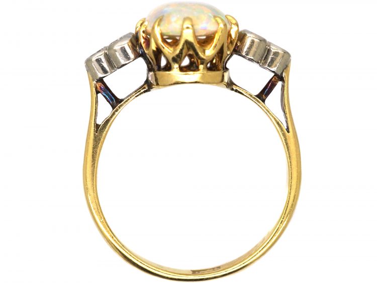 Edwardian 18ct Gold Ring set with a Large Opal with Diamond Shoulders