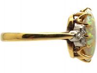 Edwardian 18ct Gold Ring set with a Large Opal with Diamond Shoulders