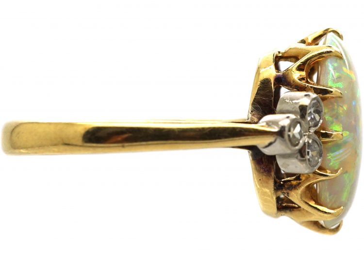 Edwardian 18ct Gold Ring set with a Large Opal with Diamond Shoulders