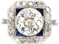 Mid 20th Century 18ct White Gold & Platinum, Octagonal Ring set with a Large Diamond Surrounded by Sapphires & Diamonds
