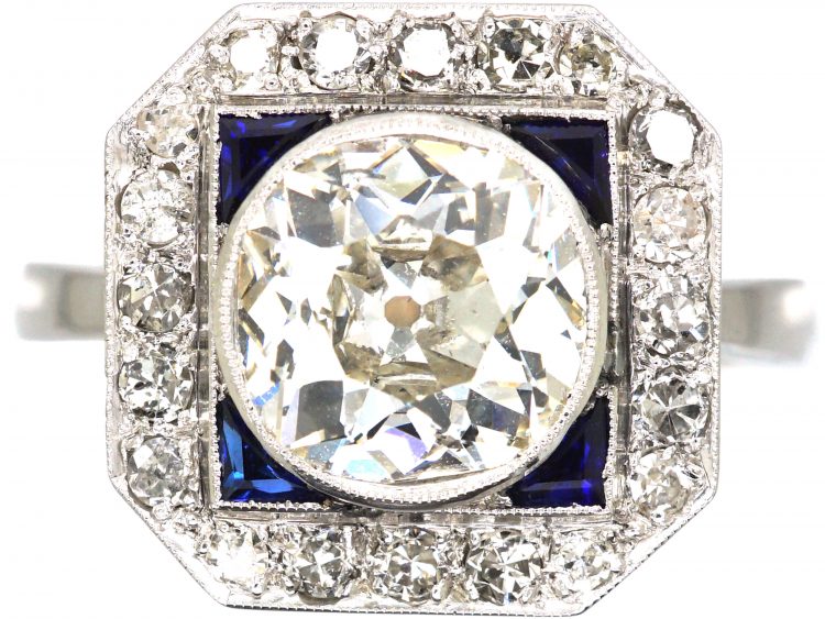 Mid 20th Century 18ct White Gold & Platinum, Octagonal Ring set with a Large Diamond Surrounded by Sapphires & Diamonds