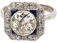 Mid 20th Century 18ct White Gold & Platinum, Octagonal Ring set with a Large Diamond Surrounded by Sapphires & Diamonds