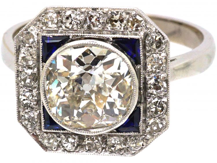 Mid 20th Century 18ct White Gold & Platinum, Octagonal Ring set with a Large Diamond Surrounded by Sapphires & Diamonds