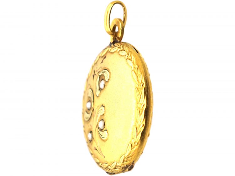 French Early 20th Century 18ct Two Colour Gold Round Locket with Mistletoe Detail set with Natural Split Pearls