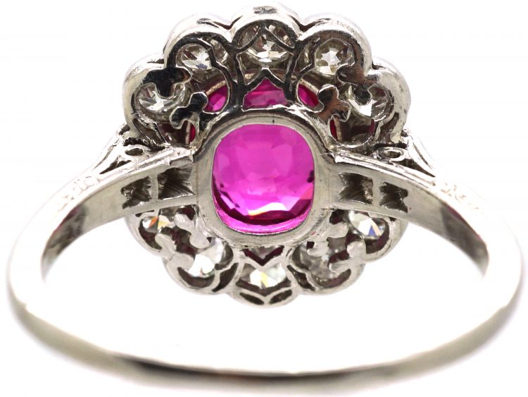 Early 20th Century Platinum, Burma Ruby & Diamond Cluster Ring with Diamond Set Shoulders