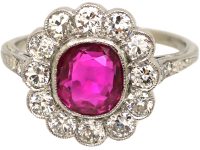 Early 20th Century Platinum, Burma Ruby & Diamond Cluster Ring with Diamond Set Shoulders