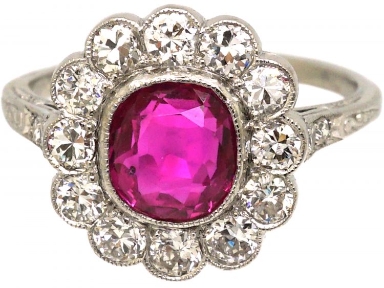 Early 20th Century Platinum, Burma Ruby & Diamond Cluster Ring with Diamond Set Shoulders