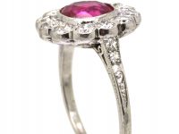 Early 20th Century Platinum, Burma Ruby & Diamond Cluster Ring with Diamond Set Shoulders