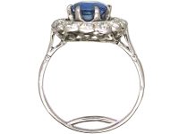 Early 20th Century French Import Platinum Large Cluster Ring set with a Sapphire & Diamonds