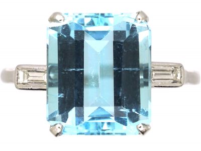 Retro Platinum Ring set with a Rectangular Cut Aquamarine with Baguette Cut Diamond Shoulderss