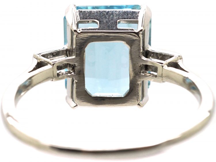Retro Platinum Ring set with a Rectangular Cut Aquamarine with Baguette Cut Diamond Shoulderss