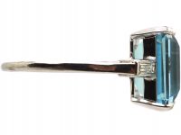 Retro Platinum Ring set with a Rectangular Cut Aquamarine with Baguette Cut Diamond Shoulderss