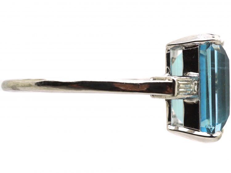 Retro Platinum Ring set with a Rectangular Cut Aquamarine with Baguette Cut Diamond Shoulderss