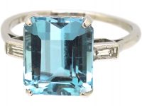 Retro Platinum Ring set with a Rectangular Cut Aquamarine with Baguette Cut Diamond Shoulderss