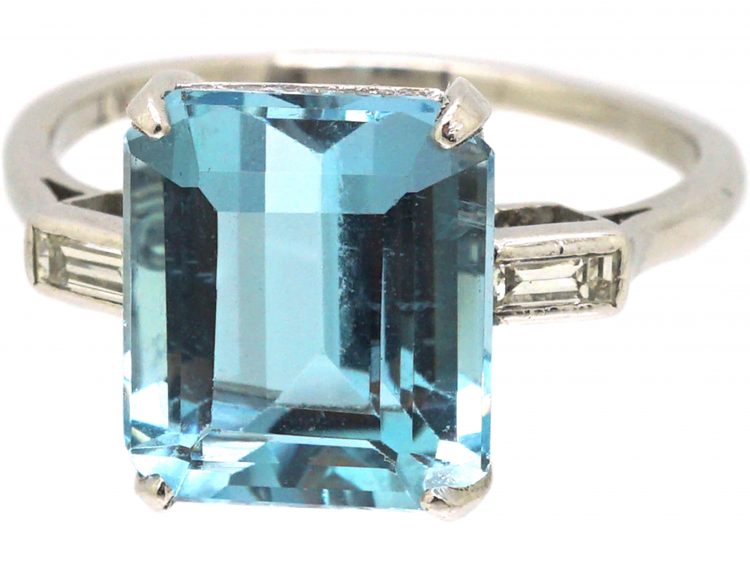 Retro Platinum Ring set with a Rectangular Cut Aquamarine with Baguette Cut Diamond Shoulderss