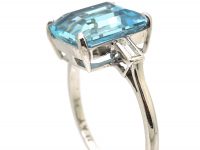 Retro Platinum Ring set with a Rectangular Cut Aquamarine with Baguette Cut Diamond Shoulderss