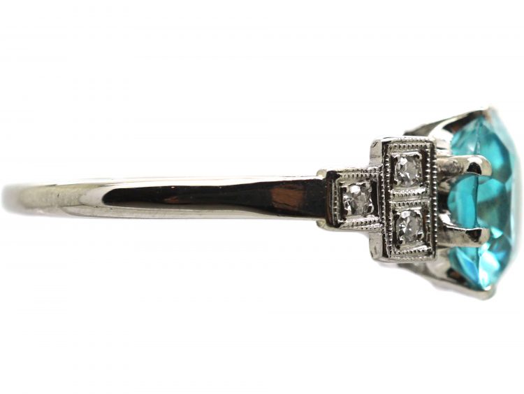 Art Deco Platinum Ring set with a Zircon with Stepped Diamond set Shoulders