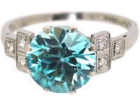 Art Deco Platinum Ring set with a Zircon with Stepped Diamond set Shoulders
