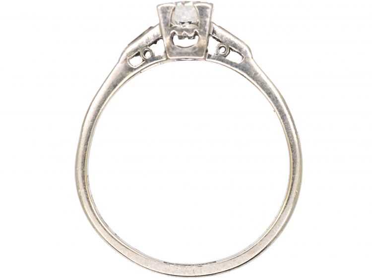 Early 20th Century Platinum, Diamond Solitaire Ring with Baguette Diamond Shoulders