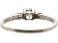 Early 20th Century Platinum, Diamond Solitaire Ring with Baguette Diamond Shoulders