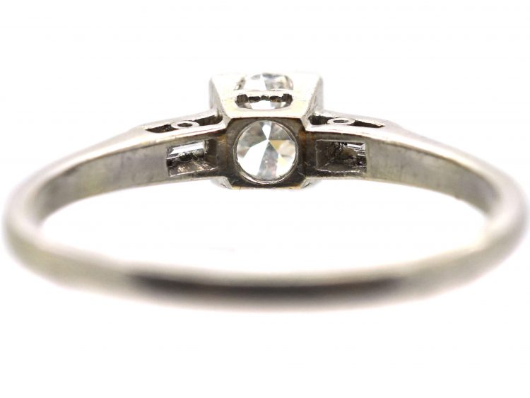 Early 20th Century Platinum, Diamond Solitaire Ring with Baguette Diamond Shoulders