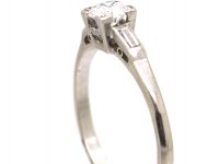 Early 20th Century Platinum, Diamond Solitaire Ring with Baguette Diamond Shoulders