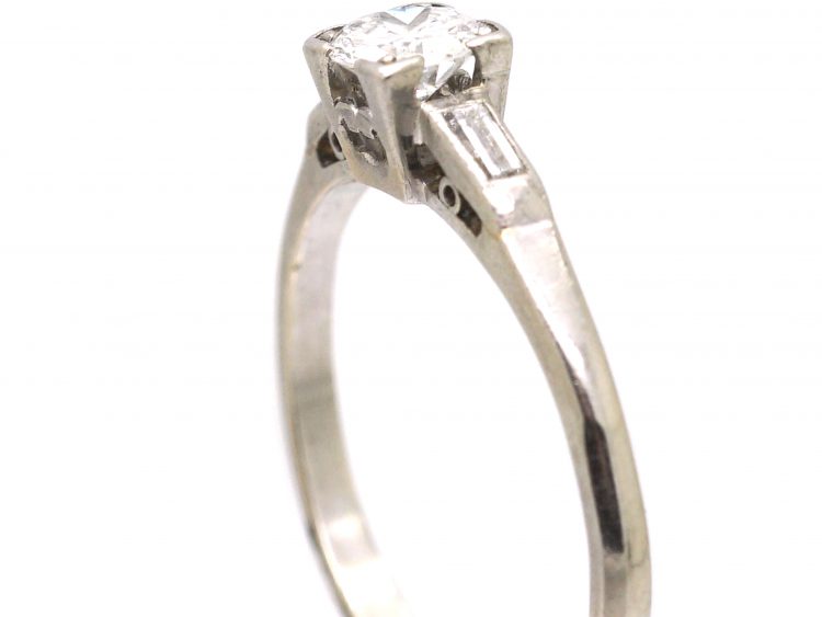 Early 20th Century Platinum, Diamond Solitaire Ring with Baguette Diamond Shoulders