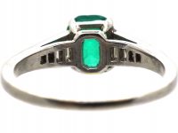 Art Deco 18ct White Gold Ring set with an Emerald with Step Cut Diamond Shoulders