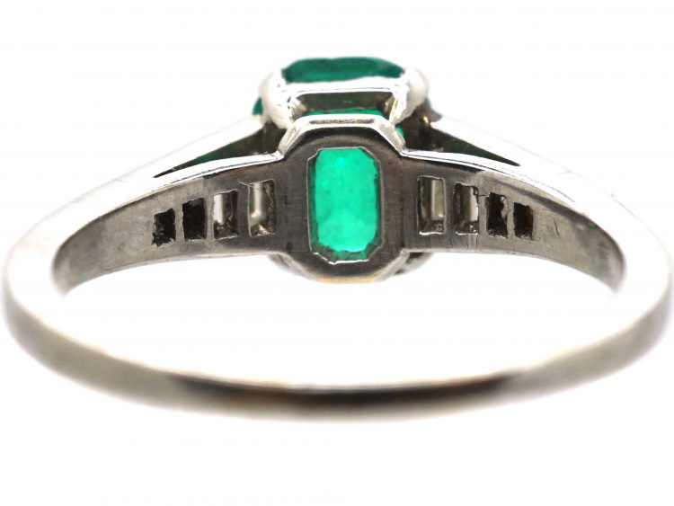 Art Deco 18ct White Gold Ring set with an Emerald with Step Cut Diamond Shoulders