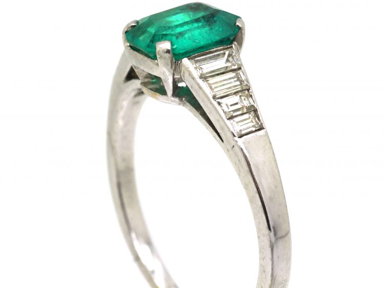 Art Deco 18ct White Gold Ring set with an Emerald with Step Cut Diamond Shoulders