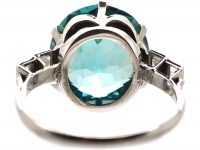 Art Deco Platinum Ring set with a Large Zircon with Baguette Diamond Shoulders