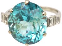 Art Deco Platinum Ring set with a Large Zircon with Baguette Diamond Shoulders