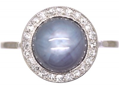 Early 20th Century 18ct White Gold, Cabochon Cut Star Sapphire & Diamond Cluster Ring